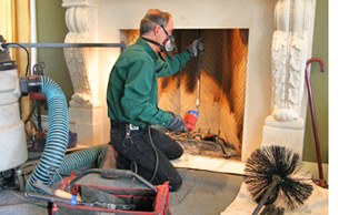 Fireplace cleaning in progress